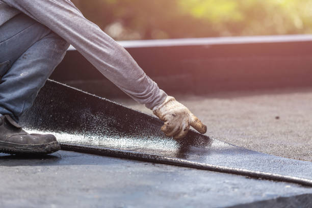 Professional Waterproofing technician working in Burtonsville, MD
